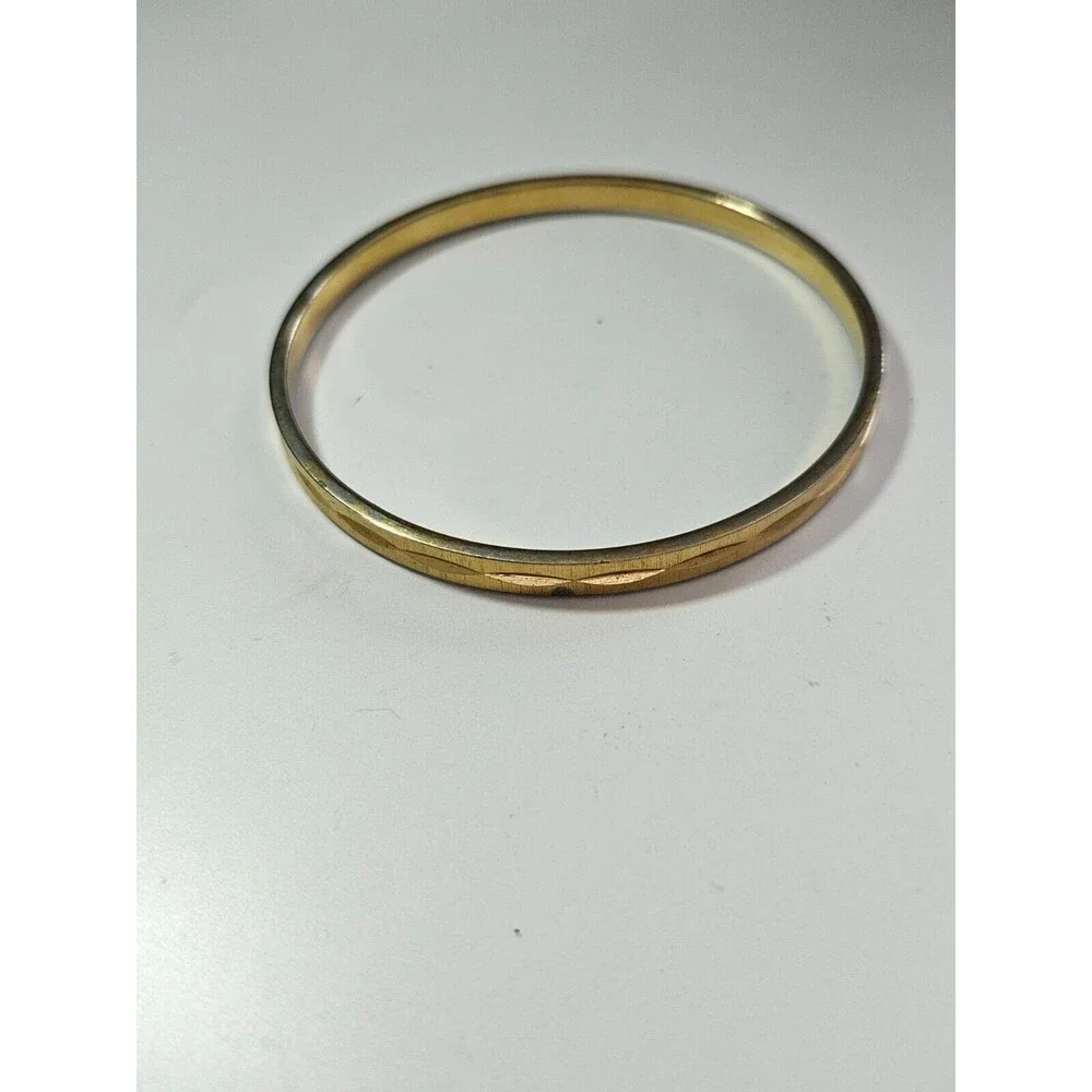 Monet gold tone diamond cut bangle bracelet 7.75